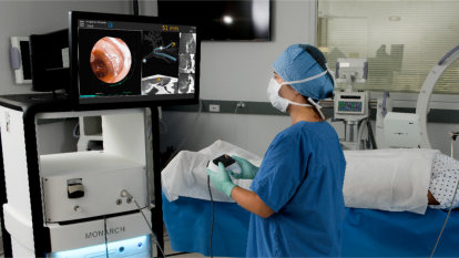 A provider using the Monarch in the Operating Room.