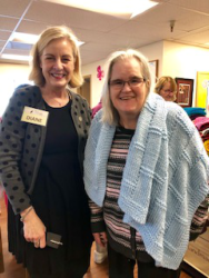 One of many happy recipients of a blanket from Alice's Embrace.