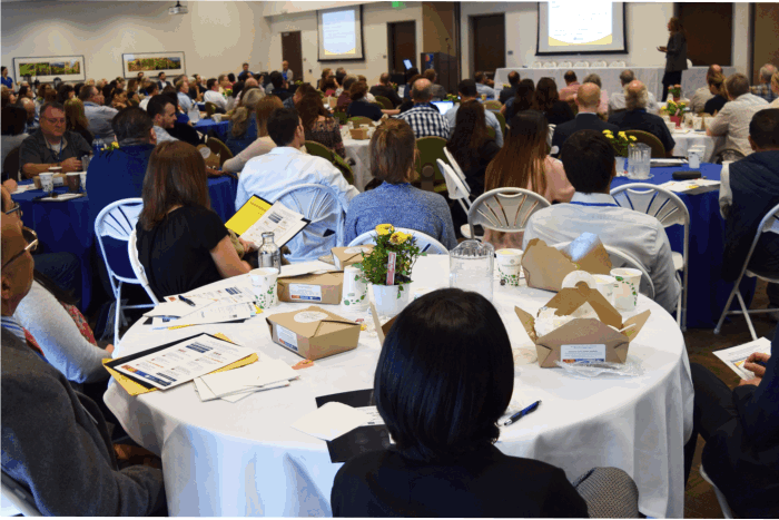 A full house of physicians and clinical providers participate in the TBI and concussion symposium which was followed by a public event featuring a panel of experts the next day.