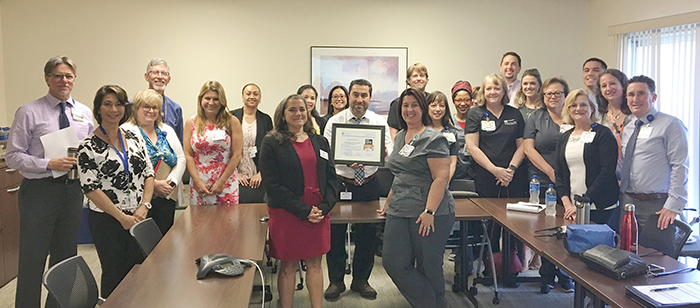 A team of  employees celebrate the Gold Plus Quality Achievement Award for the NorthBay Stroke Program.