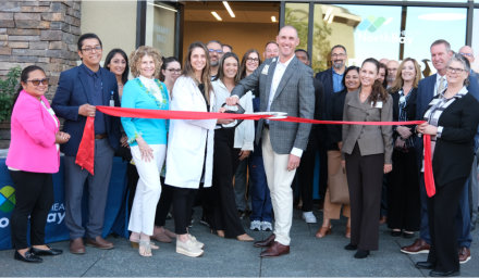Healthcare providers, NorthBay leadership, and American Canyon Chamber of Commerce members pose for the offical ribbon cutting.