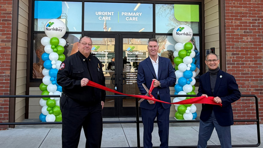 Rio Vista Fire Department Fire Chief Adam Pfenning, NorthBay CEO Mark Behl and Rio Vista Mayor Edwin Okamura cut the ribbon for the grand opening of the new Primary Care and Urgent Care clinic in Rio Vista.