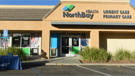 Building front of the joint Primary Care and Urgent Care location in Dixon.